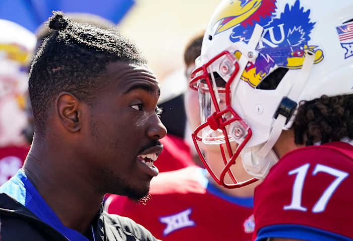 Oct 8, 2022; Lawrence, Kansas, USA; Kansas Jayhawks quarterback Jalon Daniels (6) talks with quarterback Jason Bean (17) after leaving the game with an injury during the second half against the TCU Horned Frogs at David Booth Kansas Memorial Stadium. Mandatory Credit: Jay Biggerstaff-USA TODAY Sports